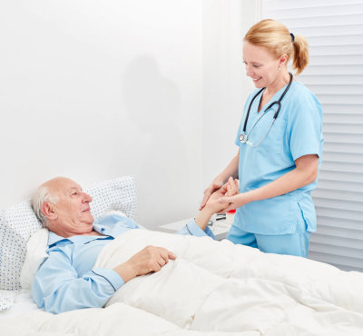 caregiver taking care oh her patient