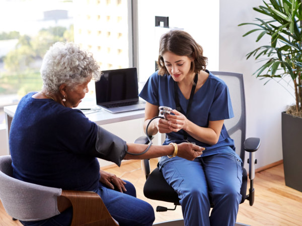 nurse consulting her patient