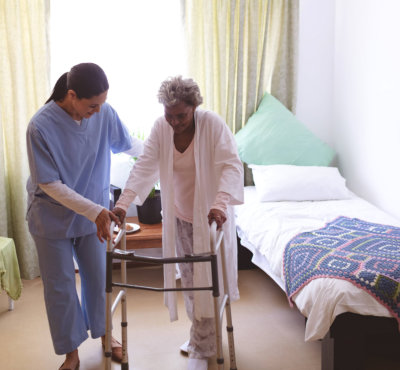 caregiver helping her patient