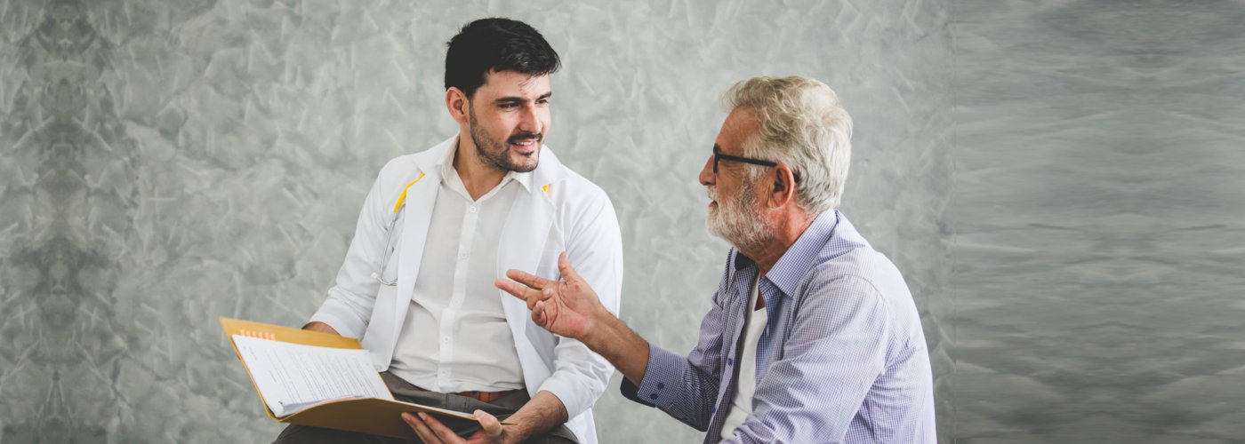 doctor consulting his patient