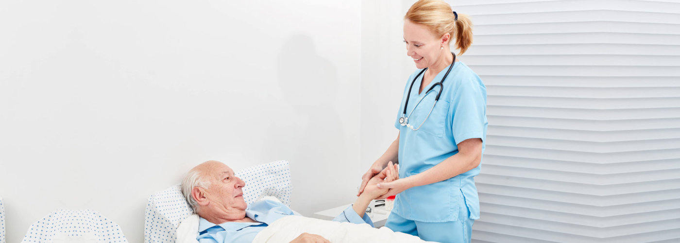 caregiver taking care oh her patient